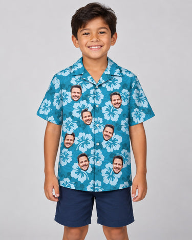 Hibiscus Island Dreams Hawaiian shirt with printed faces, worn by a child