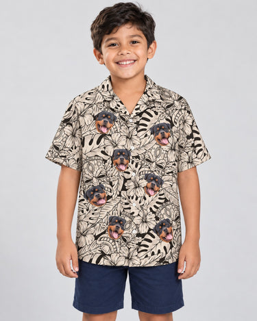 Island Tiki Vibes Hawaiian shirt with printed faces, worn by a child
