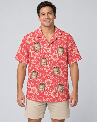 Japanese Hibiscus Blossom Hawaiian shirt with printed faces, worn by a man