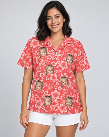 Japanese Hibiscus Blossom Hawaiian shirt with printed faces, worn by a woman
