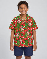 Juicy Strawberry Tropics Hawaiian shirt with printed faces, worn by a child