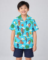 Jungle Bird Paradise Hawaiian shirt with printed faces, worn by a child