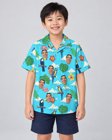 Jungle Bird Paradise Hawaiian shirt with printed faces, worn by a child