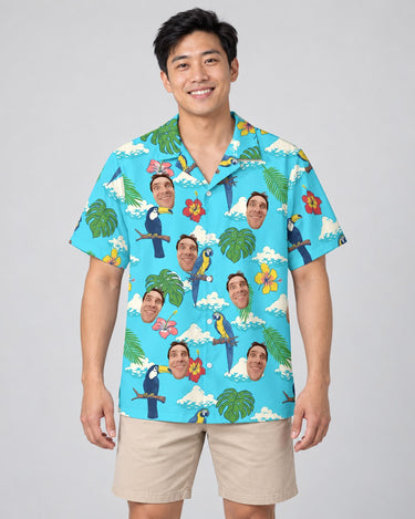 Jungle Bird Paradise Hawaiian shirt with printed faces, worn by a man