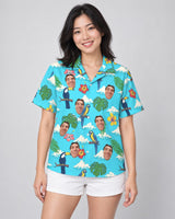 Jungle Bird Paradise Hawaiian shirt with printed faces, worn by a woman