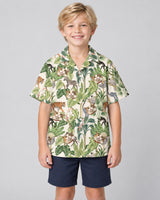 Jungle Jamboree Hawaiian shirt with printed faces, worn by a child