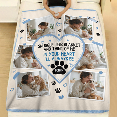Six photo pet memory blanket laid across a made bed with white linen