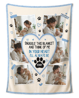 Personalised six photo pet blanket, cream with a sky blue border and paw prints, shown flat on a plain white background