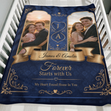 Navy and gold personalised couples photo blanket folded over the side of a wooden crib