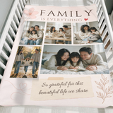 Five photo family keepsake blanket in blush pink folded over the side of a wooden crib