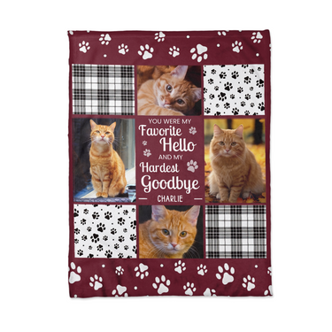 Flat lay of the personalized pet memorial blanket showing four photo squares around the Favorite Hello Hardest Goodbye quote and paw print rows