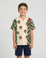 Lantern Palm Border Christmas Hawaiian Shirt with printed faces, worn by a child
