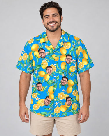Lemon Grove Breeze Hawaiian shirt with printed faces, worn by a man