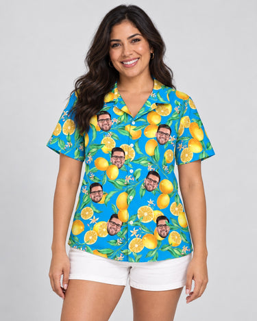 Lemon Grove Breeze Hawaiian shirt with printed faces, worn by a woman