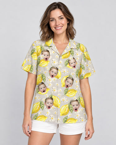 Lemon Grove Vibes Hawaiian shirt with printed faces, worn by a woman