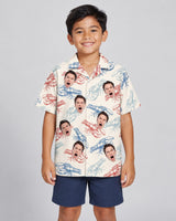 Lobster Fest Hawaiian shirt with printed faces, worn by a child