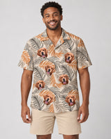 Lush Tropical Foliage Hawaiian shirt with printed faces, worn by a man