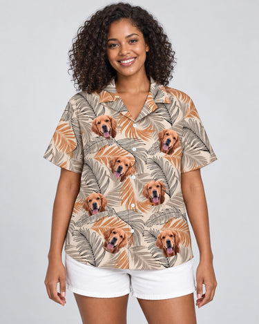 Lush Tropical Foliage Hawaiian shirt with printed faces, worn by a woman