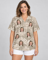 Monochrome Tropics in Cotton Grey Hawaiian shirt with printed faces, worn by a woman