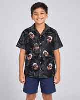 Monotropics Hawaiian shirt with printed faces, worn by a child