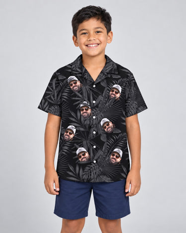 Monotropics Hawaiian shirt with printed faces, worn by a child