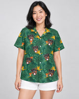 Monstera Paradise Hawaiian shirt with printed faces, worn by a woman
