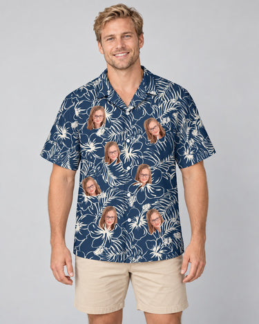 Navy Hibiscus Paradise Hawaiian shirt with printed faces, worn by a man