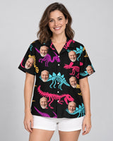 Neon T-Rex Hawaiian shirt with printed faces, worn by a woman
