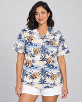 Nostalgic Tropical Paradise Hawaiian shirt with printed faces, worn by a woman