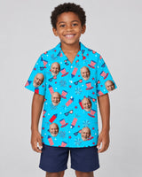 Old Glory Tropical USA Hawaiian shirt with printed faces, worn by a child