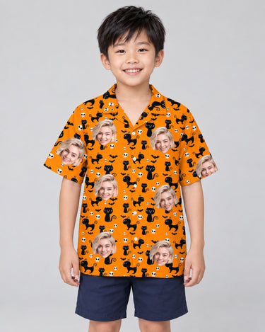 Orange Black Cat Halloween Hawaiian shirt with printed faces, worn by a child
