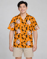 Orange Black Cat Halloween Hawaiian shirt with printed faces, worn by a man
