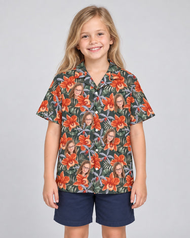 Orchid Isle Hawaiian shirt with printed faces, worn by a child