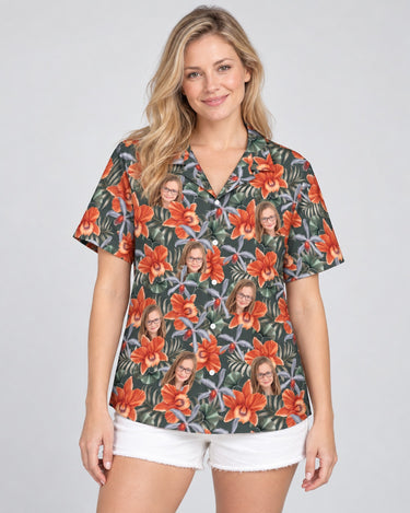 Orchid Isle Hawaiian shirt with printed faces, worn by a woman