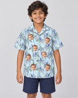 Palm Breeze Hawaiian shirt with printed faces, worn by a child