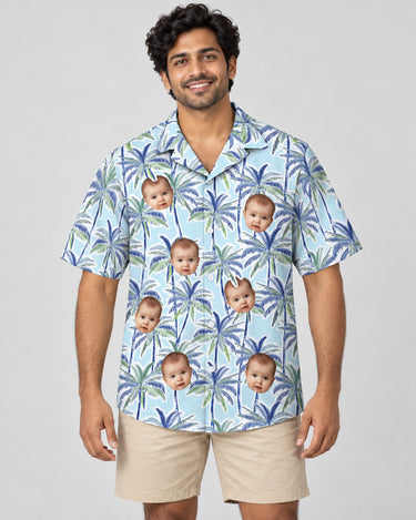 Palm Breeze Hawaiian shirt with printed faces, worn by a man
