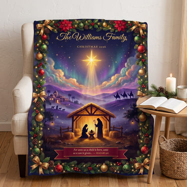 Nativity Christmas blanket with the Star of Bethlehem draped over a cream armchair in a Christian prayer corner with an open Bible, candle and pine garland