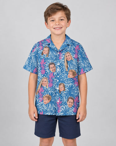 Pineapple Paradise Hawaiian shirt with printed faces, worn by a child