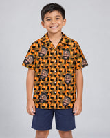 Playful Black Cat Halloween Hawaiian shirt with printed faces, worn by a child