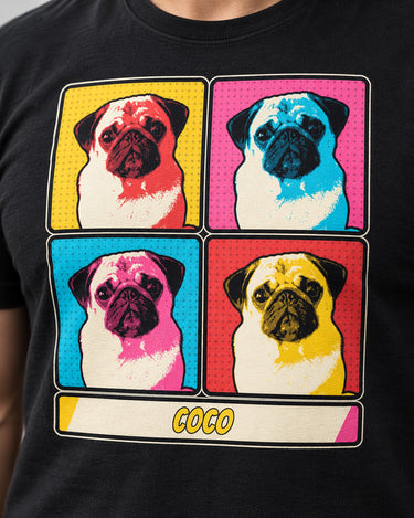 Close-up of a black pop art pet portrait tee showing four flat portrait tones, clear dark outlines, halftone dots and large comic name lettering.