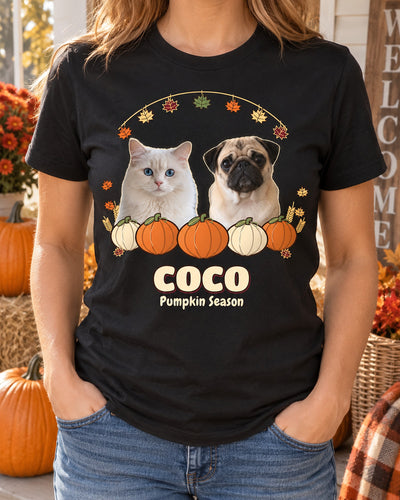 Black personalized pumpkin dog shirt worn on an autumn porch, showing a pug and white cat behind five pumpkins with the name COCO and Pumpkin Season.
