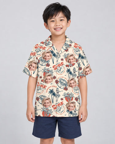 Punk Skeleton Beach Hawaiian shirt with printed faces, worn by a child