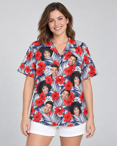Red Hibiscus Tropics Hawaiian shirt with printed faces, worn by a woman