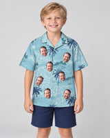 Retro Ocean Wave Hawaiian shirt with printed faces, worn by a child