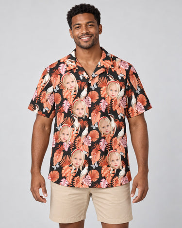 Rosy Paradise Hawaiian shirt with printed faces, worn by a man