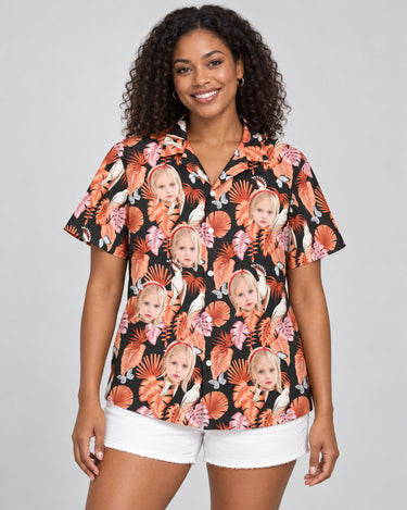 Rosy Paradise Hawaiian shirt with printed faces, worn by a woman