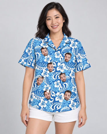 Royal Blue Tropics Hawaiian shirt with printed faces, worn by a woman