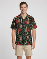 Serpent & Dagger Goth Hawaiian Shirt with printed faces, worn by a man