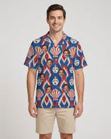 Shell Bell Ikat Christmas Hawaiian Shirt with printed faces, worn by a man