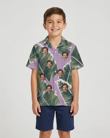 Snowy Banana Leaves Christmas Hawaiian Shirt with printed faces, worn by a child